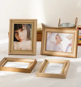 Nordic wooden photo frame detail view, tabletop picture frame for room decor and photo display.