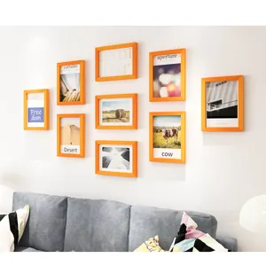 Gallery wall photo frame set for living room decor, creative orange multi-frame collage display.