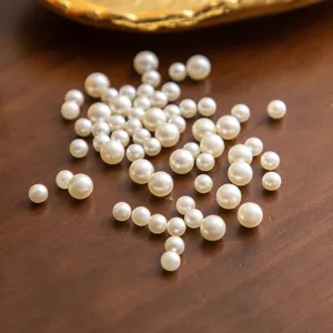 Mixed size flatback faux pearls for DIY resin crafts, jewelry making, and phone case decor.