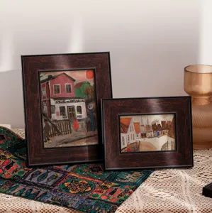 Retro wooden picture frames set for wall hanging and desktop display in vintage decor.