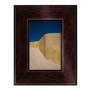 Retro wooden picture frame for wall hanging, dark brown decorative art photo frame display.