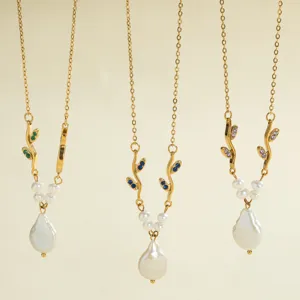 Detail shot of colorful cubic zirconia branch necklaces with shiny baroque freshwater pearls.