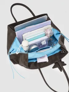 Stijlvolle zachte lederen shopper voor dames met grote capaciteit en contrastvoering.