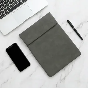 Grey leather laptop sleeve for 14 inch notebook and tablet, protective case accessory.