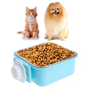 Close-up of the stainless steel pet bowl insert and cage-fixed screw mechanism filled with dry food.