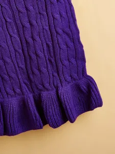 Purple cable knit pet sweater detail, soft warm woolen dog apparel with cute ruffle hem.
