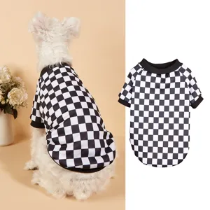 Detailed view of the black and white checkered pet sweater with a cozy crew neck and ribbed trim.