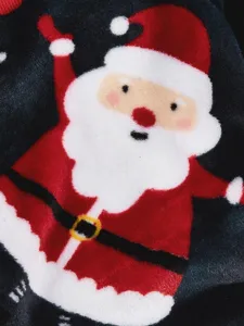 Soft coral fleece pet clothes detail showing cute Santa Claus print for warm winter wear.