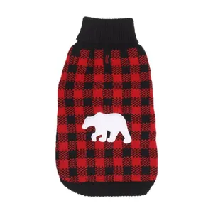 Close-up of pet knitted sweater red black plaid pattern with white bear patch detail.