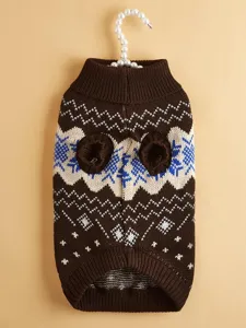 Detailed shot of brown pet knit sweater with Nordic snowflake pattern and pearl hanger.