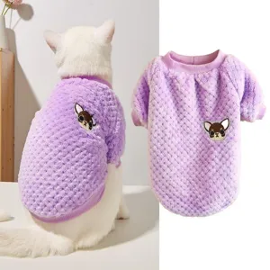Detail view of the soft purple coral fleece pet sweater featuring cute embroidered dog patch.