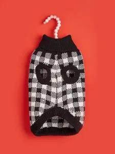Black and white houndstooth pet sweater detail, knitted turtleneck design for dogs and cats.