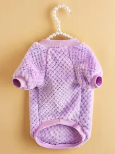 Close-up view of the purple coral fleece pet clothes, featuring soft texture and ribbed collar.