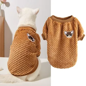 Detailed view of brown coral fleece pet sweater, soft warm threaded crew neck dog clothes.