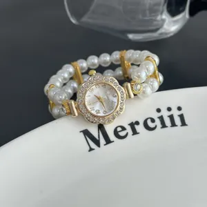 Elegante reloj de pulsera de perlas con esfera de flor de estrás, reloj de cuarzo.