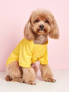 Cozy yellow pet hoodie detail shot, cute dog wearing solid color sportswear, comfortable dog apparel.