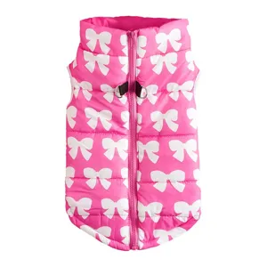 Gilet d'hiver pour chien rose avec imprimé de nœuds blancs, veste chaude avec fermeture éclair.