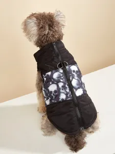 Close-up detail of dog winter puffer vest featuring cool skull print and zipper back.
