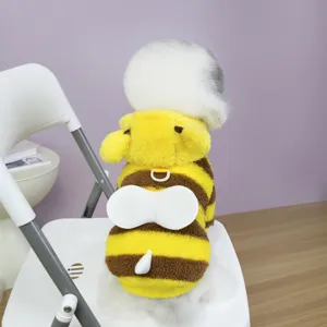 Detailed view of soft plush pet bee costume with yellow stripes and warm hood for winter wear.