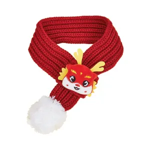 Red knitted pet scarf detail with plush dragon face horns and cute white pom pom accessory.