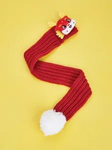 Festive red pet knitted scarf with cute dragon plush and white pom-pom detail for winter.