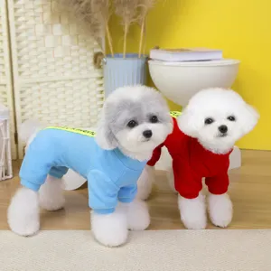 Details of thick fleece pet jumpsuit, warm winter dog clothes in blue and red colors.