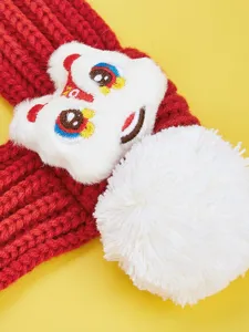 Red knitted pet scarf with fluffy white pom-pom and cute lion dance patch for dogs and cats