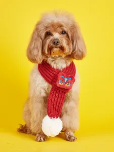 Red knitted pet scarf with lion dance plush decoration and white pom-pom for dogs cats
