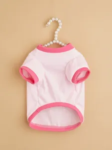 Pink pet dog t-shirt detail view, cute puppy clothes with contrast color trim for small dogs.