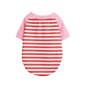 Red and white striped pet t-shirt detail showing pink short sleeves and soft fabric texture.