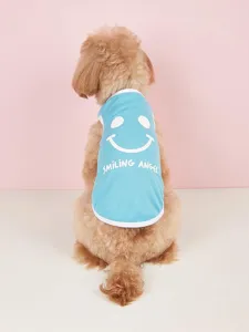 Cute blue pet vest detail view, breathable fabric with cute smiley face and print.
