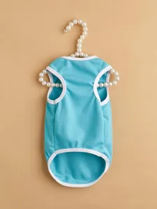 Cute blue dog vest with white trim, soft summer pet clothes detail shot for small dogs.