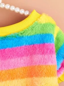 Colorful striped pet fleece sweater close-up showing soft plush texture and cozy fit.