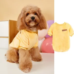 Soft fleece pet sweater detail view, yellow warm puppy winter clothes with classic leather patch.