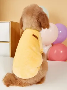 Cozy yellow fleece pet sweater detail, soft warm winter dog apparel with classic label.
