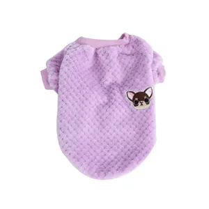 Detailed view of the purple flannel pet sweater featuring a cute dog embroidery patch.