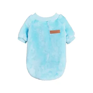 Soft fleece pet winter sweater detail view in light blue color with a cute classic tag.
