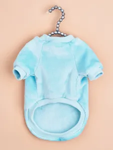 Detailed close-up view of soft blue pet winter fleece warm clothes, comfortable fabric.