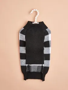 Detailed view of a classic black and white plaid dog knit sweater, warm pet apparel for small dogs.
