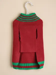 Christmas pet knitted sweater detail shot, red and green festive dog cat apparel close up.