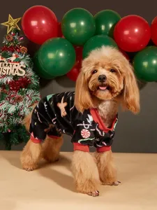 Detail shot of pet fleece onesie with Christmas gingerbread man pattern, warm and cozy wear for dogs.