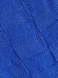 Royal blue knitted fabric detail featuring a classic grid texture for soft pet apparel.