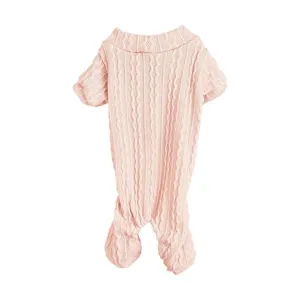 Close-up detail of the cozy pink cable knit dog sweater featuring classic vertical stripes.