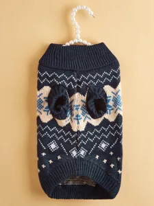 Knit pet sweater detail view featuring cozy high collar and classic Nordic snowflake patterns.