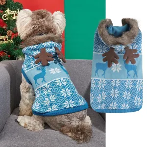 Detailed view of winter pet sweater with cute reindeer antlers and classic snowflake pattern.
