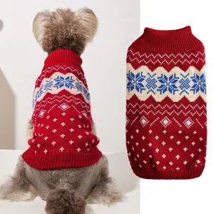 Detailed view of the red winter pet knitted sweater featuring classic snowflake and wave patterns.