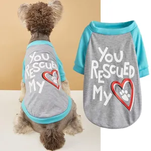 Grey and blue colorblock pet t-shirt with cute rescue letter print and heart paw pattern.