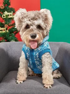Detailed view of the cozy blue knitted pet sweater with classic Nordic snowflake and deer pattern.