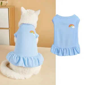 Cute blue pet dress with rainbow cloud pattern, breathable cat and dog skirt apparel.