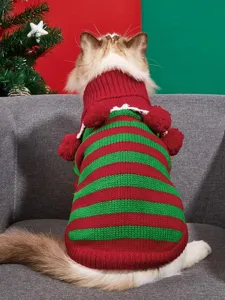 Christmas cat sweater detail view showing red and green striped knit design with cute pompom lapel.